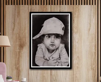Charcoal paintings shown on a wall