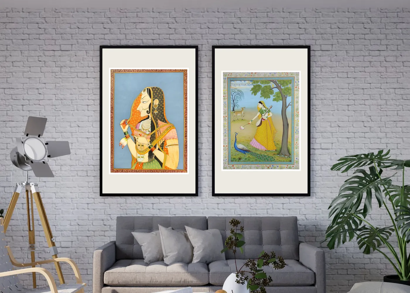 Bani Thani and Ragini miniature paintings framed as a pair on a white brick wall