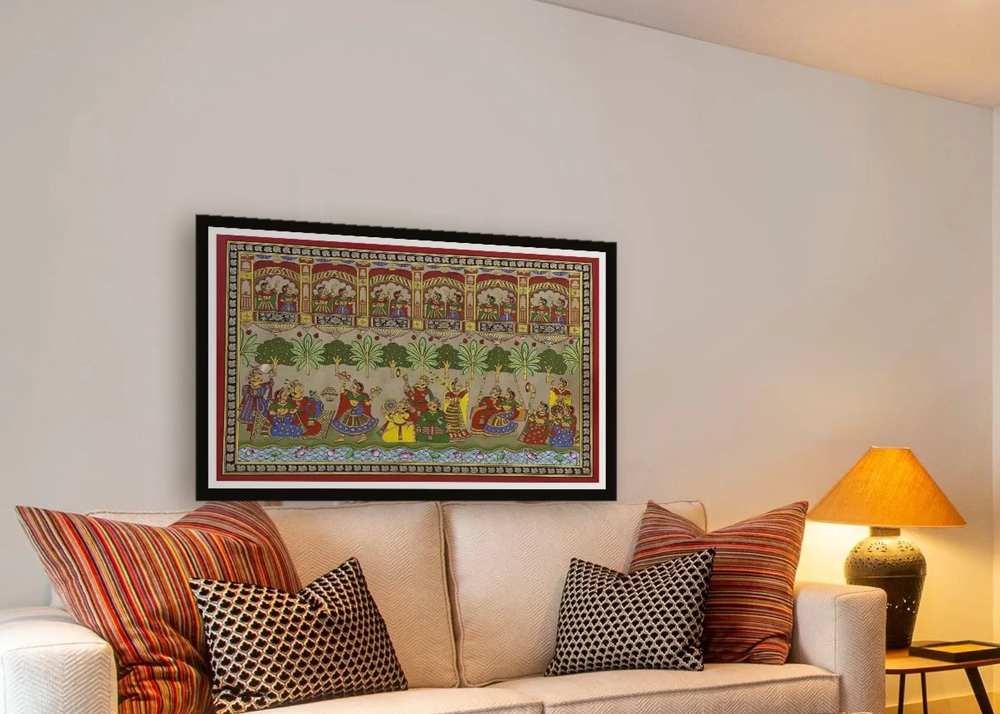 Phad painting of a king and queen in a garden above a sofa in a warm living room